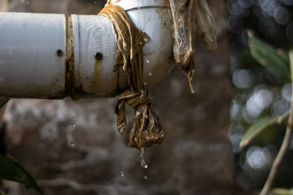 Water leaking from a burst pipe